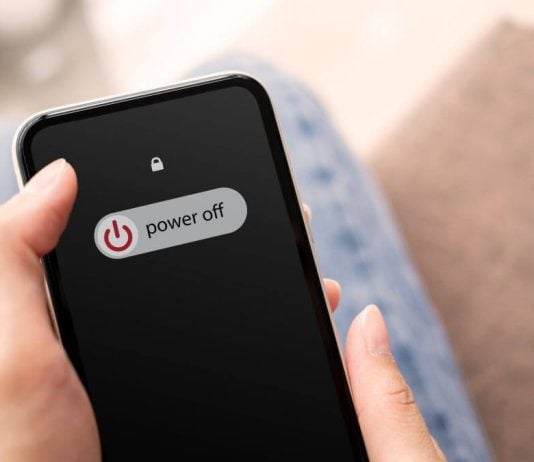 Someone sliding 'power off' on their phone
