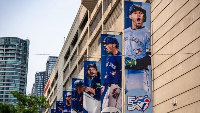 Toronto Blue Jays players on banners Blue Jays bettor banned by MLB, Ohio for threatening manager John Schneider